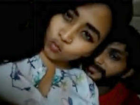 Busty Indian babe gives cousin a titjob and rides him hard