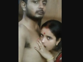 Passionate couple's rendezvous in a picturesque village