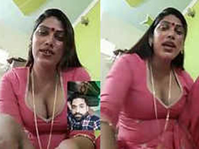 Aunty's busty cleavage on display in hot video
