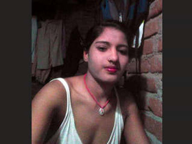Indian girl goes nude in village setting