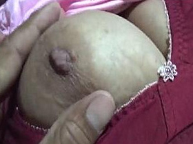 Indian husband indulges in self-pleasure by fondling his wife's breasts and vagina