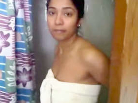 Middle-aged Indian aunt showcases her large breasts on camera