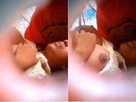 Exclusive video of a desi Indian girl sucking boobs