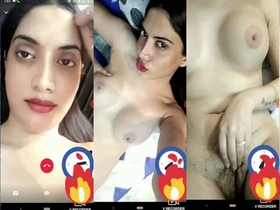 A seductive Indian woman captures her nude body in a video clip