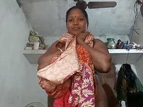 South Indian aunt strips down to reveal her breasts and vagina