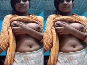 Exclusive Desi Indian girl showcases her big boobs in porn video