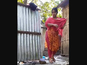 Hidden camera captures Indian village woman's private bathing session