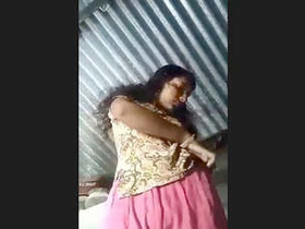 A village girl flaunts her boobs and pussy in a steamy video