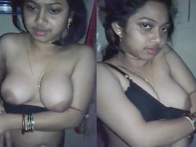 Sensual Indian bhabhi flaunts her perfect boobs in black lingerie