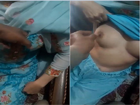 Beautiful Indian girl massages her partner's breasts