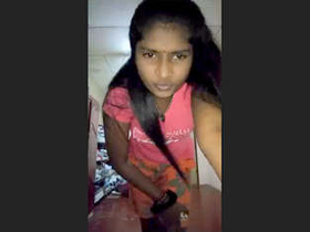 Indian woman covertly taking self-portraits in workplace