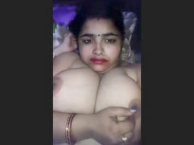 Indian bhabhi flaunts her curvy body and round ass in a tank top