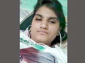 An Indian college student displays her breasts and buttocks during a video chat
