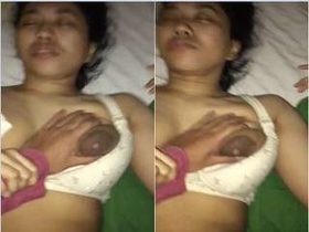 Nepalese girl masturbates with her boobs