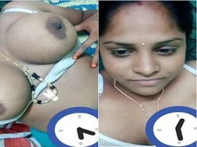 Part 1 of a Desi bhabhi's steamy video with big boobs