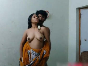 Indian couple engages in standing sex
