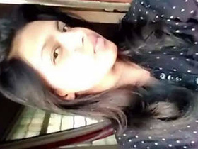 Young live-streaming performer records a video for her boyfriend