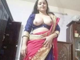 Indian momo with adorable charm bares her breasts