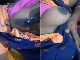 Exclusive video of Indian bhabhi revealing her boobs and mammaries