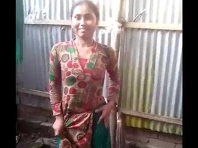 Village girl takes outdoor shower