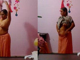 Middle-aged Indian aunt's outfit switch