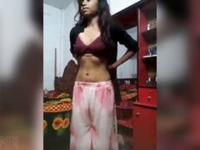 Desi college girl flaunts her big boobs and bald pussy in solo striptease