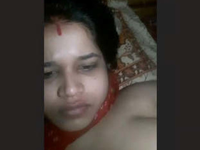 Indian bhabhi pleasures herself with her big boobs