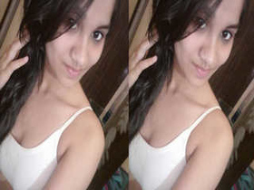 Exclusive video of a cute Indian girl stripping and flaunting her big boobs