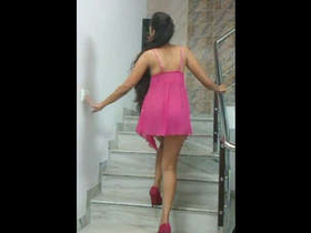 A stunning Indian girlfriend strips on a staircase