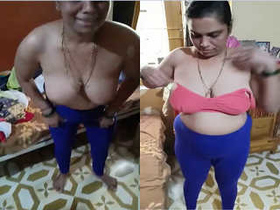 Exclusive Tamil Bhabhi in Clothes: A Sensual Performance