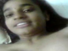 Tamil girl with large breasts talks dirty in a new video