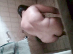 Indian aunt's nude bath recorded by concealed surveillance