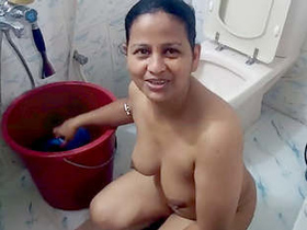 Indian spouse filmed indulging in risqué behavior during shower at home