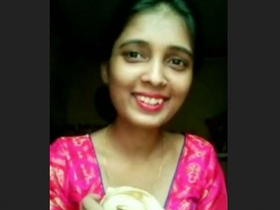 Pretty girlfriend strips and teases her boyfriend in a video call