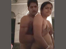 A very passionate couple engaging in intense sexual activity