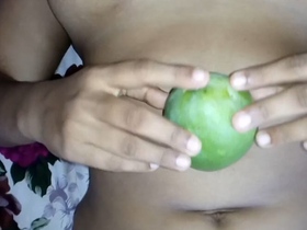 Desi babe puts mango in pussy and cums hard