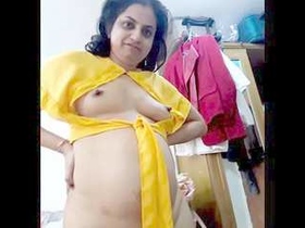South Asian aunt strips and dances sensually