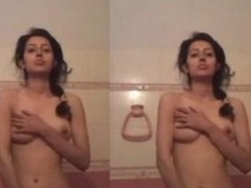Indian girl flaunts her big tits and pussy in a steamy video