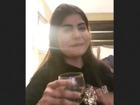 Randi chats in Hindi while flaunting her big breasts in a hotel room with a friend