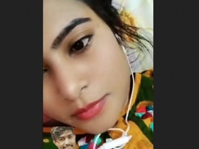 Indian girl flaunts her large breasts in a seductive manner
