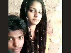 Indian village sweethearts kissing and having sex in the open air