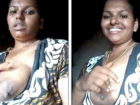 Aunty with big natural breasts on display for neighbours