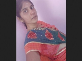 Watch a cute Indian college girl flaunt her big breasts in a steamy video update