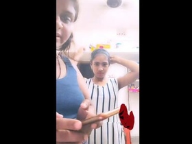 Real Indian lesbian couple dances sensually in family home