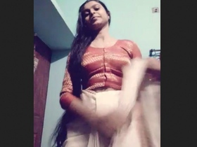 Adorable girl stripping naked for your pleasure