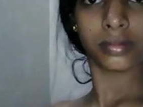 Tamil wife flaunts her big boobs and shaved pussy in intimate video