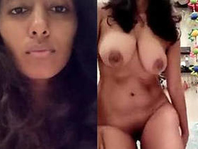 Watch a busty Indian girl flaunt her assets in a titillating video