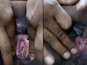 Aroused middle-aged Indian wife stimulates her smooth genitalia with her fingers