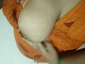 Tamil girl masturbates with her massive breasts