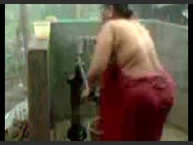 Indian wife uses a shower pump to cleanse herself